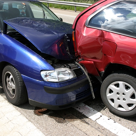 Blue And Red Car In An Accident