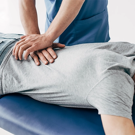 Person Lying Down Receiving Chiropractic Care